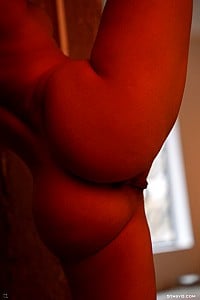 Esteria - Esteria Q's naked body moves breathtakingly under the alluring red lights